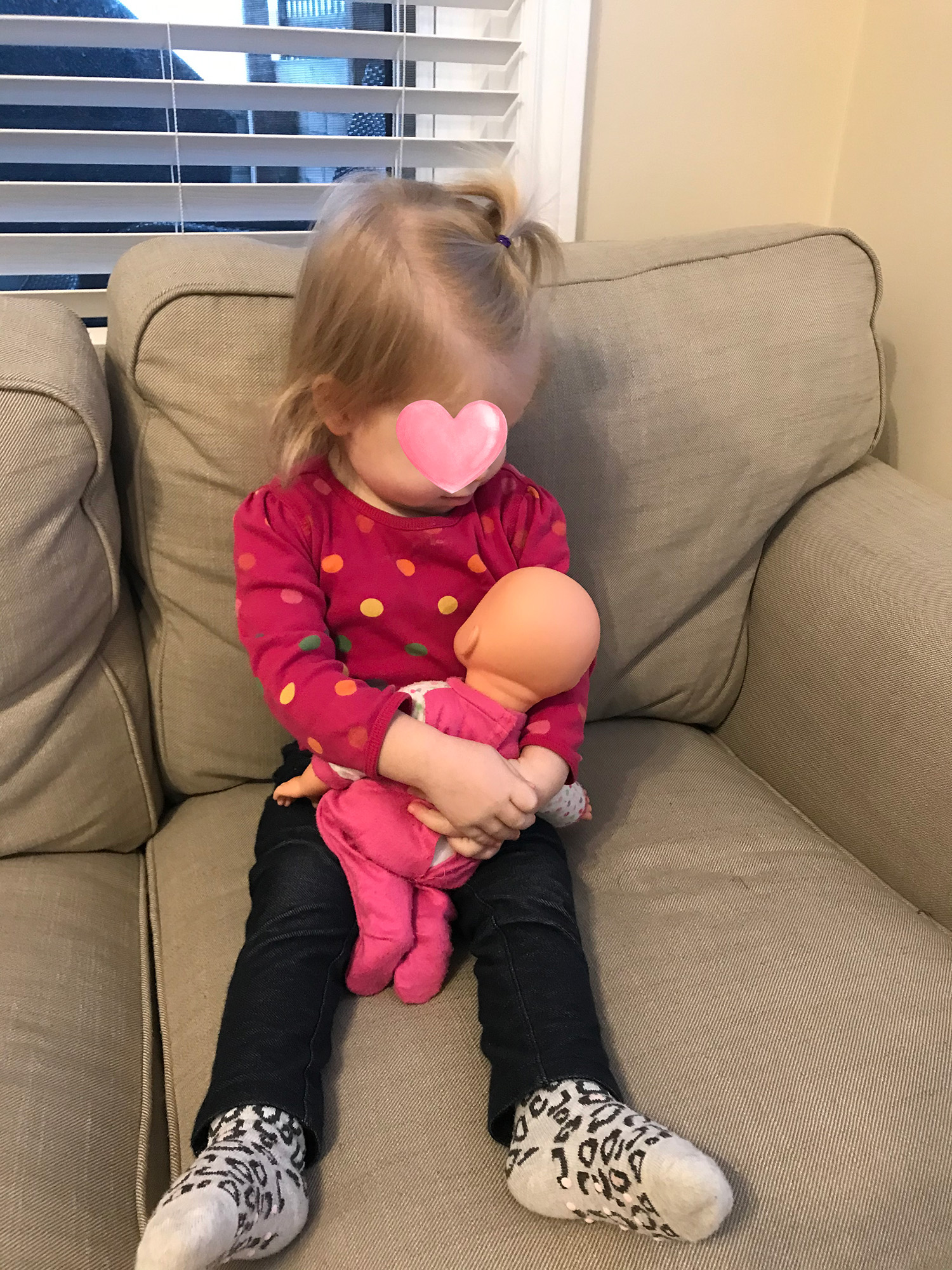 snuggle with doll